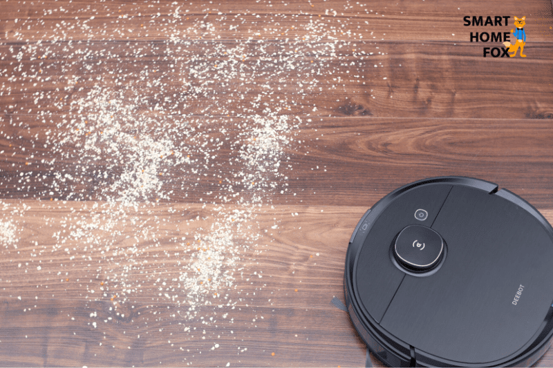 OZMO T8 AIVI during the oatmeal suction test on a hardwood floor